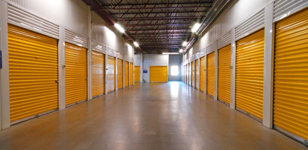 storage units with yellow roll up doors