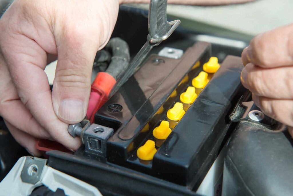 disconnecting motorcycle battery in storage unit